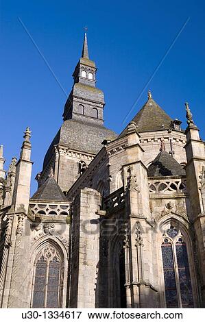 Stock Photo - Saint-Sauveur church, in the old town of Dinan, in Cotes d? Armor department, Brittany France. Fotosearch