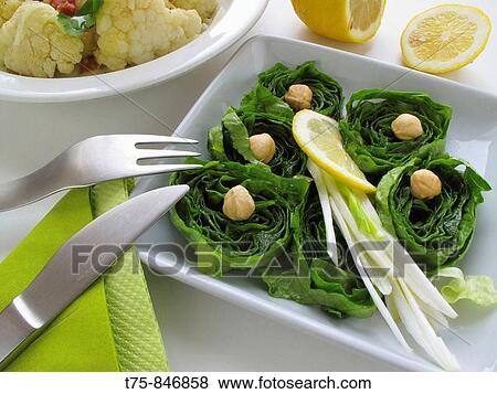 Salad, lettuce roses with tender onions and hazelnuts View Large Photo Image Stock Photo - Salad, lettuce roses with tender onions and hazelnuts. Fotosearch