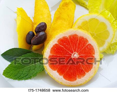 Salad of mango, grapefruit, lemon and olives View Large Photo Image Stock Photo - Salad of mango, grapefruit, lemon and olives. Fotosearch