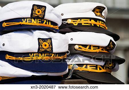 Sale of hats and caps in San Marcos square, Saint Marks Square, St Mark's square, Venice, Veneto, Italy, Europe. View Large Photo Image Stock Photo - Sale of hats and caps in San Marcos square, Saint Marks Square, St Mark's square, Venice, Veneto, Italy, Europe.. Fotosearch