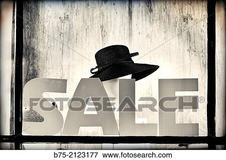 Sale, showcase announcing reductions in a hat shop in central London, England, UK, Europe. View Large Photo Image Stock Photo - Sale, showcase announcing reductions in a hat shop in central London, England, UK, Europe.. Fotosearch