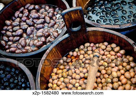 Sales of traditional products -Mediterranan olives- in the market and selected market Viktualienmarkt, Munich, Germany View Large Photo Image Stock Image - Sales of traditional products -Mediterranan olives- in the market and selected market Viktualienmarkt, Munich, Germany. Fotosearch