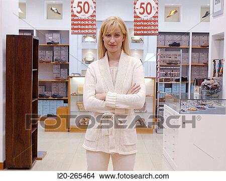 Saleswoman in shopping center View Large Photo Image Picture - Saleswoman in shopping center. Fotosearch