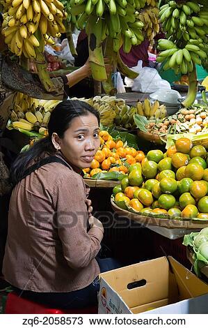 Saleswoman on a Market in Phnom Penh, Cambodia. View Large Photo Image Stock Image - Saleswoman on a Market in Phnom Penh, Cambodia.. Fotosearch