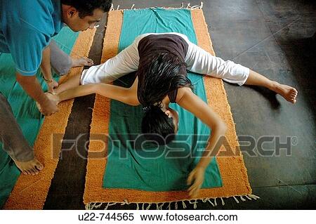 Saligao Goa, India, a yoga lesson at the Ayurvedic Natural Health Centre View Large Photo Image Stock Photography - Saligao Goa, India, a yoga lesson at the Ayurvedic Natural Health Centre. Fotosearch