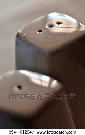 Salt and pepper dispensers View Large Photo Image Stock Photo - Salt and pepper dispensers. Fotosearch