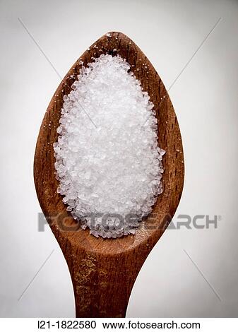 Salt in a wooden spoon. View Large Photo Image Stock Image - Salt in a wooden spoon.. Fotosearch