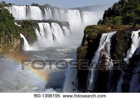 Salto Floriano and rainbow, Iguassu falls, Iguazu national park, Puerto Iguazu, Brazil side taken from Argentina. View Large Photo Image Stock Photography - Salto Floriano and rainbow, Iguassu falls, Iguazu national park, Puerto Iguazu, Brazil side taken from Argentina.. Fotosearch