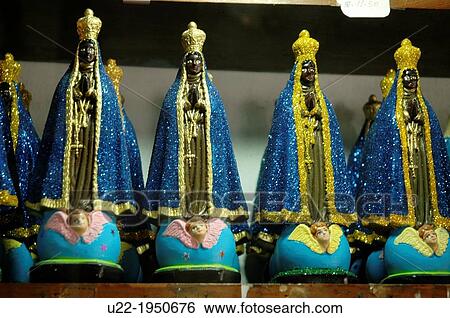 Salvador de Bahia, Bahia, Brazil, statuettes of Nossa Senhora da Concei??o Aparecida, patron saint of Brasil, sold in a shop View Large Photo Image Stock Photograph - Salvador de Bahia, Bahia, Brazil, statuettes of Nossa Senhora da Concei??o Aparecida, patron saint of Brasil, sold in a shop. Fotosearch