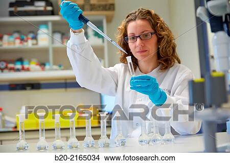 Picture - Sample preparation with micropipette. Polymer characterization. Biotechnology Laboratory. Energy and Environment Division. Tecnalia Research and Innovation. Miano. Alava. Basque Country. Spain.. Fotosearch