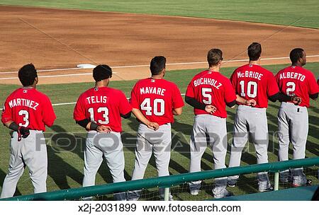 San Antonio, Texas - Minor league baseball. Members of the Frisco (Texas) RoughRiders listen to the national anthem before a game against the San Antonio Missions in the Double-A Texas League. View Large Photo Image Stock Photo - San Antonio, Texas - Minor league baseball. Members of the Frisco (Texas) RoughRiders listen to the national anthem before a game against the San Antonio Missions in the Double-A Texas League.. Fotosearch