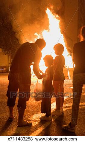 Stock Photo - `San Joan? Bonfire Verbena de San Juan In Diputacion street Barcelona Catalonia Spain. Fotosearch
