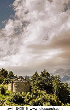 San Juan y San Pablo chapel in Tella, Escuain valley, Huesca Pyrenees, Aragon, Spain View Large Photo Image Stock Photograph - San Juan y San Pablo chapel in Tella, Escuain valley, Huesca Pyrenees, Aragon, Spain. Fotosearch