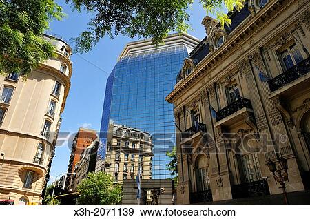 Stock Photo - San Martin Palace and in the background the new building of the Ministry of Foreign Affairs and Worship, Plaza General San Martin, Retiro district, Buenos Aires, Argentina, South America.. Fotosearch