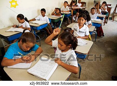 San Pedro, Belize - Students at St Peter's Elementary School Two students share a desk View Large Photo Image Stock Image - San Pedro, Belize - Students at St Peter's Elementary School Two students share a desk. Fotosearch