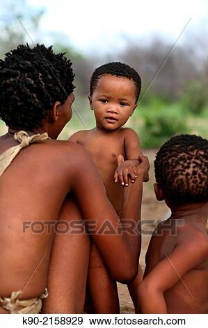 San woman with her kid, Namibia, Africa. View Large Photo Image Stock Photo - San woman with her kid, Namibia, Africa.. Fotosearch