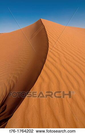 Sand dune in the Sahara Desert at Erg Chigaga, Morocco View Large Photo Image Stock Image - Sand dune in the Sahara Desert at Erg Chigaga, Morocco. Fotosearch