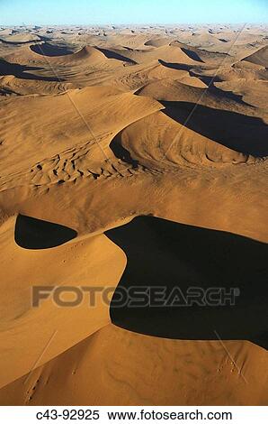Sand dunes, Namib-Naukluft National Park. Namib desert, Namibia View Large Photo Image Stock Photography - Sand dunes, Namib-Naukluft National Park. Namib desert, Namibia. Fotosearch