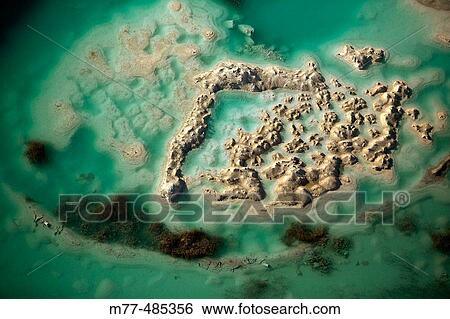 Sand formations in lime stone mine, water, aerial view. Gotland. Sweden. View Large Photo Image Stock Photograph - Sand formations in lime stone mine, water, aerial view. Gotland. Sweden.. Fotosearch