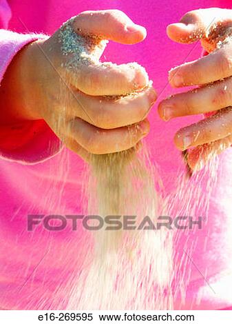 sand slipping through fingers View Large Photo Image Stock Photography - sand slipping through fingers. Fotosearch