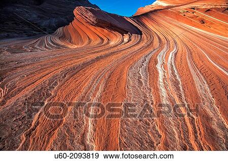 Sandstone erosion has produced highly textured parallel lines and groves in the landscape at Sand Cove at Coyote Buttes, Arizona. View Large Photo Image Stock Photo - Sandstone erosion has produced highly textured parallel lines and groves in the landscape at Sand Cove at Coyote Buttes, Arizona.. Fotosearch