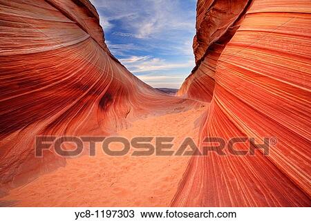 Sandstone formation called Wave in Coyote Buttes north area illuminated by reflected morning light deep in one southwestern canyon View Large Photo Image Stock Image - Sandstone formation called Wave in Coyote Buttes north area illuminated by reflected morning light deep in one southwestern canyon. Fotosearch