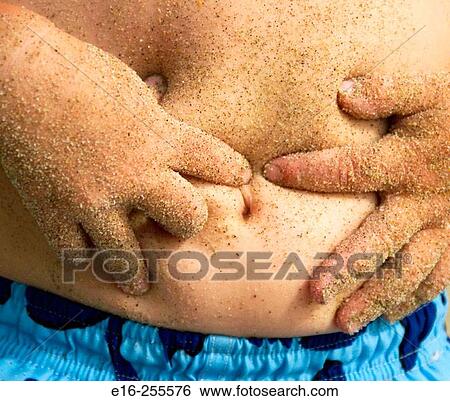 Stock Photograph - sandy stomach. Fotosearch