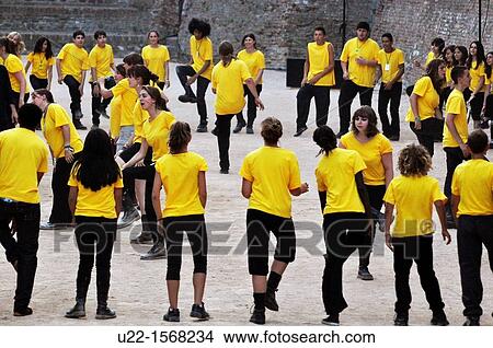 Santarcangelo di Romagna (Rimini, Italy): adolescents of an international theater company making a performance during the Theater Festival (July) View Large Photo Image Picture - Santarcangelo di Romagna (Rimini, Italy): adolescents of an international theater company making a performance during the Theater Festival (July). Fotosearch