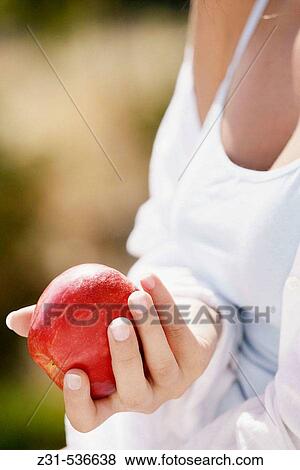 Santhi, Apple, Hand, Detail View Large Photo Image Stock Photo - Santhi, Apple, Hand, Detail. Fotosearch