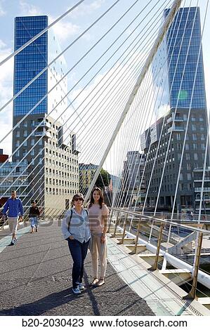 Santiago Calatrava's Zubizuri footbridge across Nervion river and Isozaki Towers by Japanese architect Arata Isozaki. Bilbao. Bizkaia. Euskadi. Spain. Basque Country. Spain. View Large Photo Image Stock Image - Santiago Calatrava's Zubizuri footbridge across Nervion river and Isozaki Towers by Japanese architect Arata Isozaki. Bilbao. Bizkaia. Euskadi. Spain. Basque Country. Spain.. Fotosearch