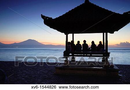 Stock Photograph - Sanur beach at dawn, Bali, Indonesia. Fotosearch