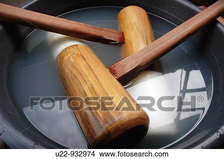 Sao Roque (Sao Paulo, Brazil): traditional wooden hammers used to beat rice to make cookies at the Festival das Cerejeiras (Cherry Blossom Festival), a annual event of the immigrants of Japanese origins View Large Photo Image Picture - Sao Roque (Sao Paulo, Brazil): traditional wooden hammers used to beat rice to make cookies at the Festival das Cerejeiras (Cherry Blossom Festival), a annual event of the immigrants of Japanese origins. Fotosearch