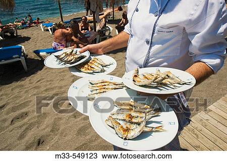 Sardines. Restaurante Beach Club El Fuerte. Playa de Venus. Marbella. Andalucia. Spain. View Large Photo Image Stock Image - Sardines. Restaurante Beach Club El Fuerte. Playa de Venus. Marbella. Andalucia. Spain.. Fotosearch