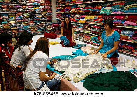 Saree shop at the Rusholme area where many immigrants live Manchester, England, UK View Large Photo Image Stock Photo - Saree shop at the Rusholme area where many immigrants live Manchester, England, UK. Fotosearch