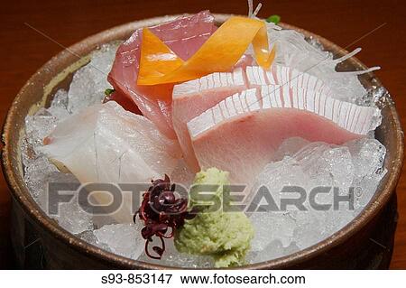Sashimi, pieces of raw fish, one course of a Kaiseki lunch set, this style of food is said to be the pinnacle of Japanese cuisine, and an adjunct to the tea ceremony View Large Photo Image Stock Photo - Sashimi, pieces of raw fish, one course of a Kaiseki lunch set, this style of food is said to be the pinnacle of Japanese cuisine, and an adjunct to the tea ceremony. Fotosearch