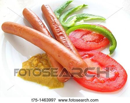 Sausages, tomato, peppers and mustard View Large Photo Image Stock Photo - Sausages, tomato, peppers and mustard. Fotosearch