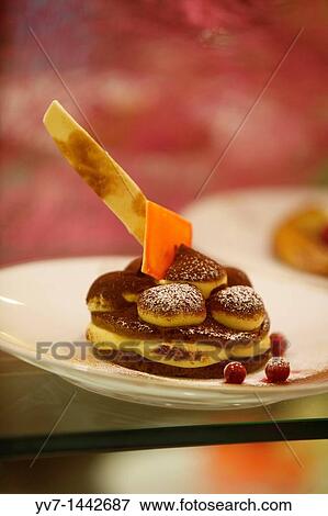 Stock Photo - Savini Restaurant A dessert in a sncak bar showcase Milan, Lombardy, Italy, Europe. Fotosearch