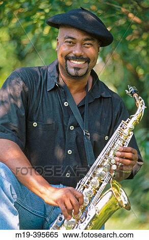 saxaphone player in a beret View Large Photo Image Stock Photography - saxaphone player in a beret. Fotosearch
