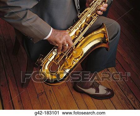Saxophone player View Large Photo Image Stock Image - Saxophone player. Fotosearch