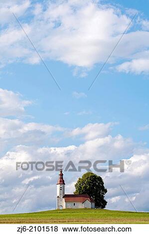 Scenery with clouds and church. Slovenia. View Large Photo Image Stock Photo - Scenery with clouds and church. Slovenia.. Fotosearch