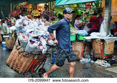 Stock Photo - Scenes from the Pak Klong Talat, the flower market in Bangkok, Thailand.. Fotosearch