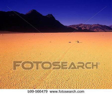 Stock Photo - Scenic moving rocks. The Racetrack, Death Valley National Park, California, USA.. Fotosearch