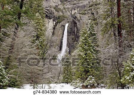 Stock Image - Scenic photo of Yosemite Falls in Yosemite National Park of California taken in the winter. Fotosearch