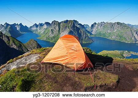 Scenic view from wild mountain campsite on Reinebringen peak, Reine, Lofoten islands, Norway View Large Photo Image Stock Photo - Scenic view from wild mountain campsite on Reinebringen peak, Reine, Lofoten islands, Norway. Fotosearch
