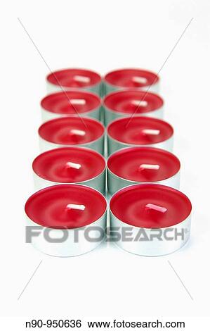 Scented candals isolated against a white background View Large Photo Image Stock Photograph - Scented candals isolated against a white background. Fotosearch