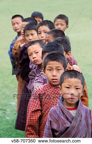 Schoolboys, nyimshong village, zhemgang district, Bhutan View Large Photo Image Stock Image - Schoolboys, nyimshong village, zhemgang district, Bhutan. Fotosearch
