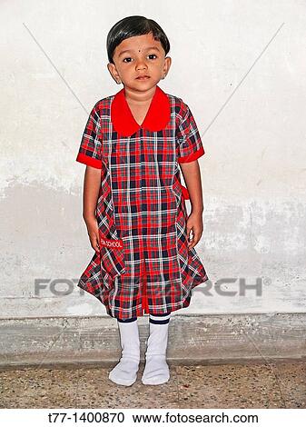 Schoolgirl wearing school uniform, Pune, Maharashtra, India View Large Photo Image Stock Image - Schoolgirl wearing school uniform, Pune, Maharashtra, India. Fotosearch