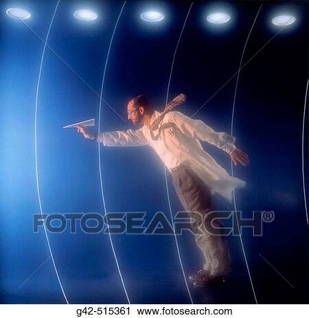 Scientist performing aerodynamics testing of paper airplane in wind tunnel. View Large Photo Image Stock Image - Scientist performing aerodynamics testing of paper airplane in wind tunnel.. Fotosearch