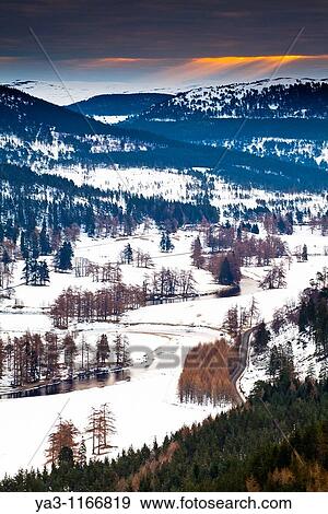 Scotland, Scottish Highlands, Cairngorms National Park The River Dee meandering through snow covered fields and mountains near Braemar View Large Photo Image Stock Photo - Scotland, Scottish Highlands, Cairngorms National Park The River Dee meandering through snow covered fields and mountains near Braemar. Fotosearch