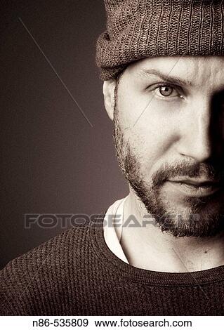 Scruffy man in hat, fashion View Large Photo Image Stock Photo - Scruffy man in hat, fashion. Fotosearch